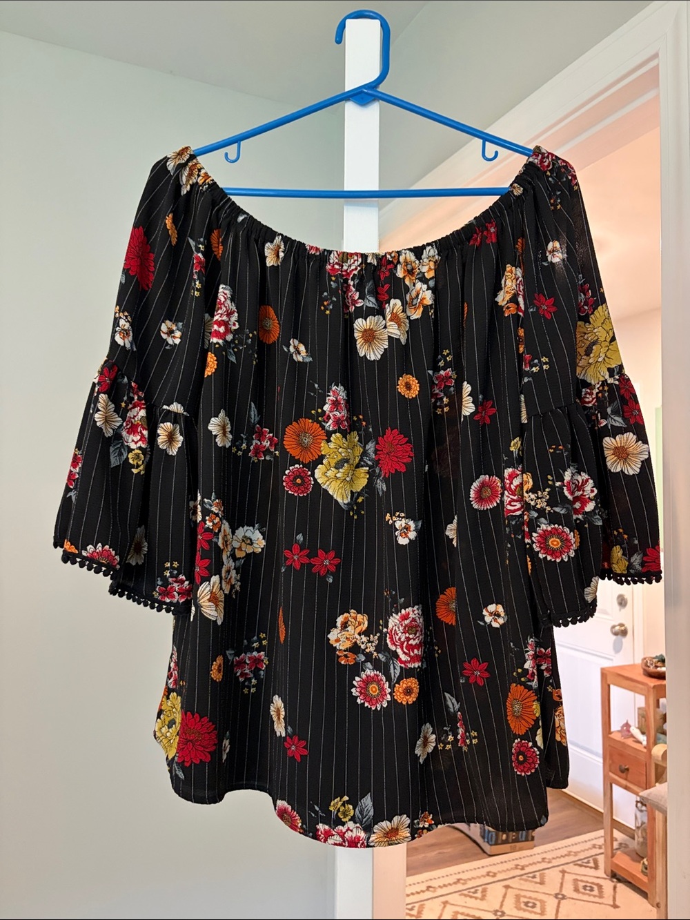 Black Floral Off-Shoulder Tunic Top with Pom Trim